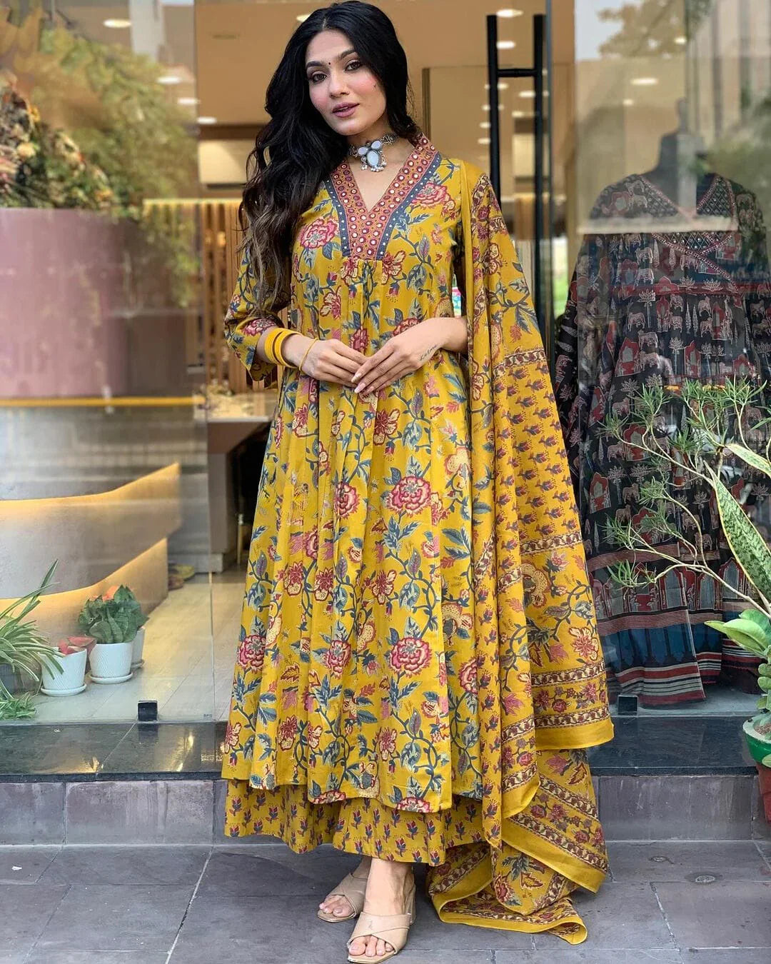Yellow floral printed cotton suit set with mulmul dupatta