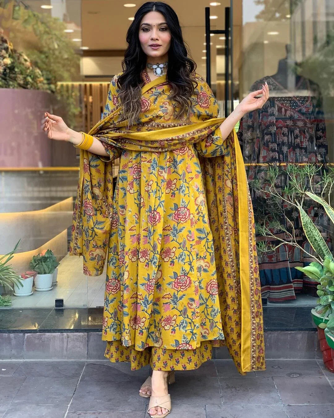 Yellow floral printed cotton suit set with mulmul dupatta
